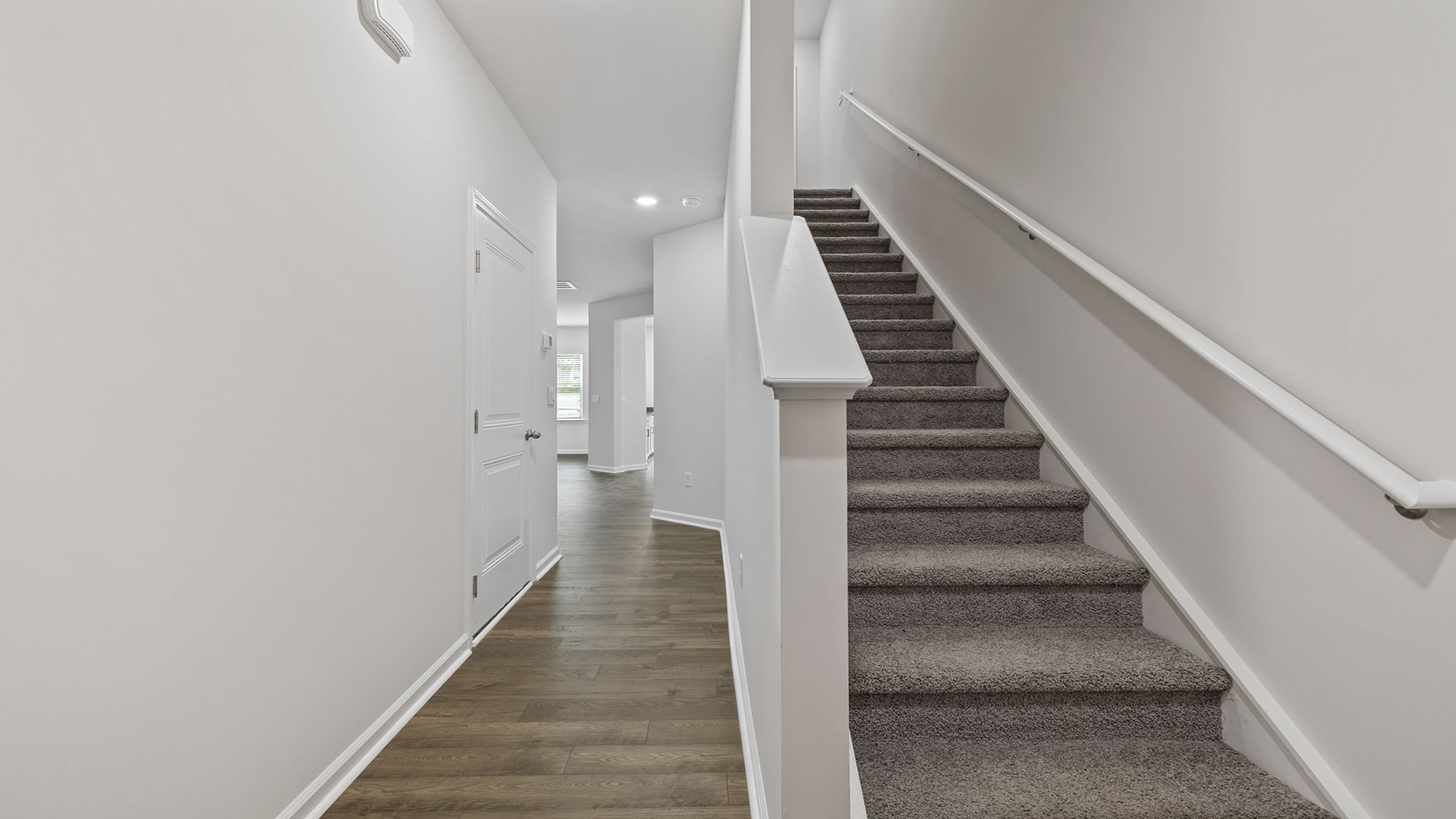 Entrance and stairwell to the upper level.