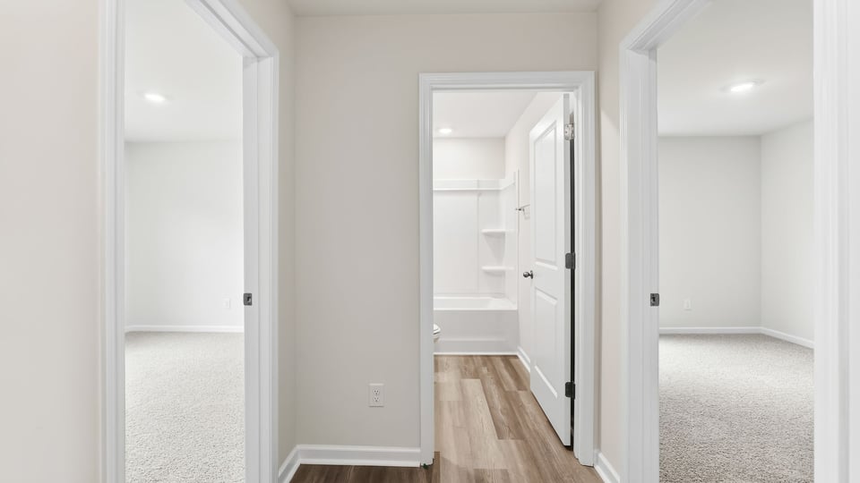 Hallway to bathrooms.