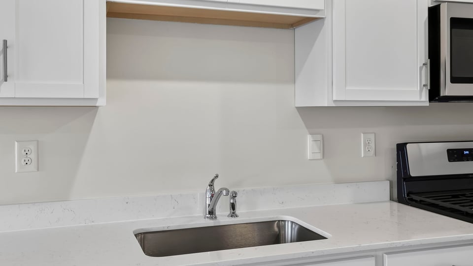 Kitchen with cabinets.