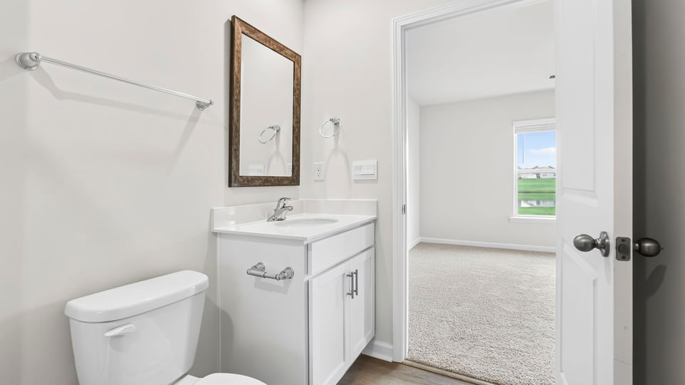 Primary bathroom with vanity sink.