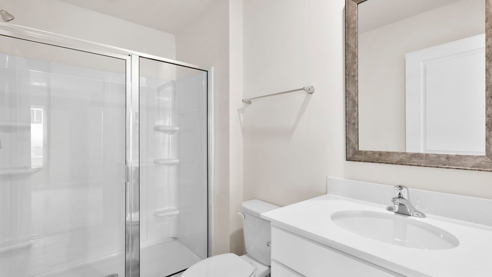 Primary bathroom with vanity sink.