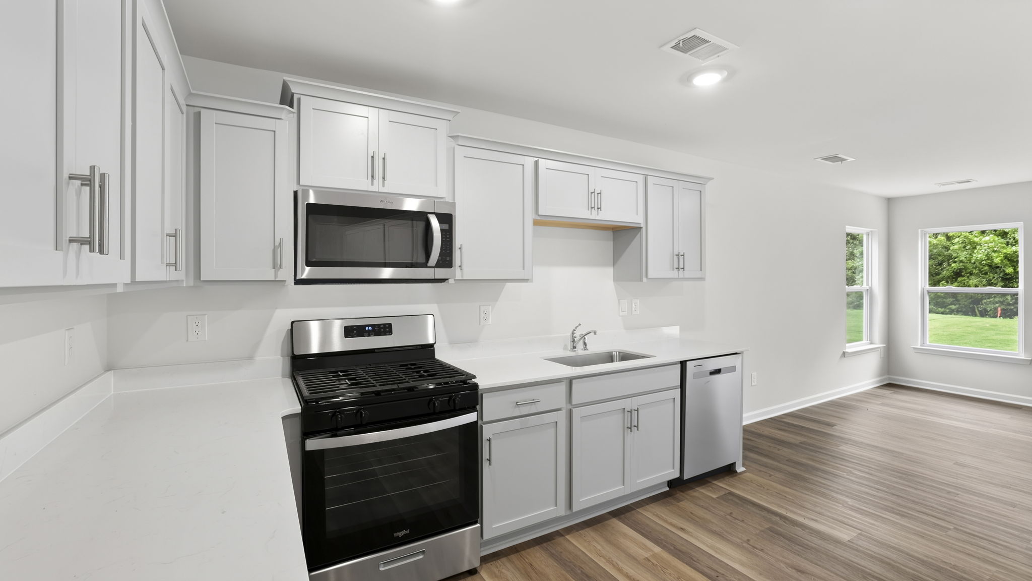 Kitchen with quartz countertops.