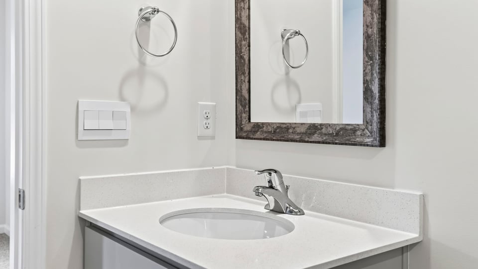 Bathroom with single vanity sink.