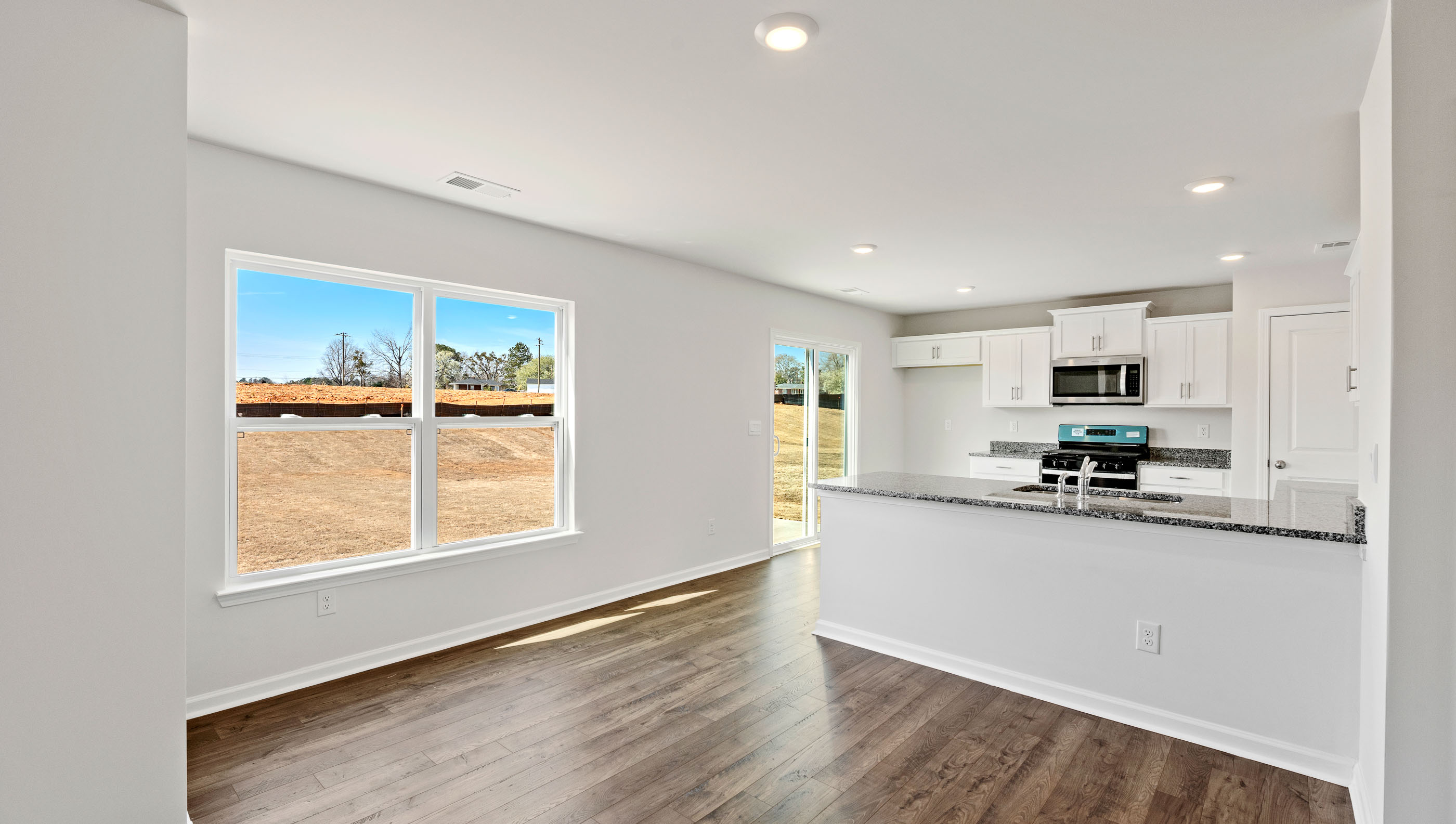 View of kitchen and dining area.