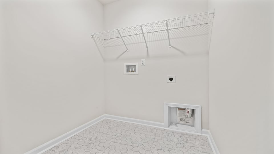 Laundry room with shelving.