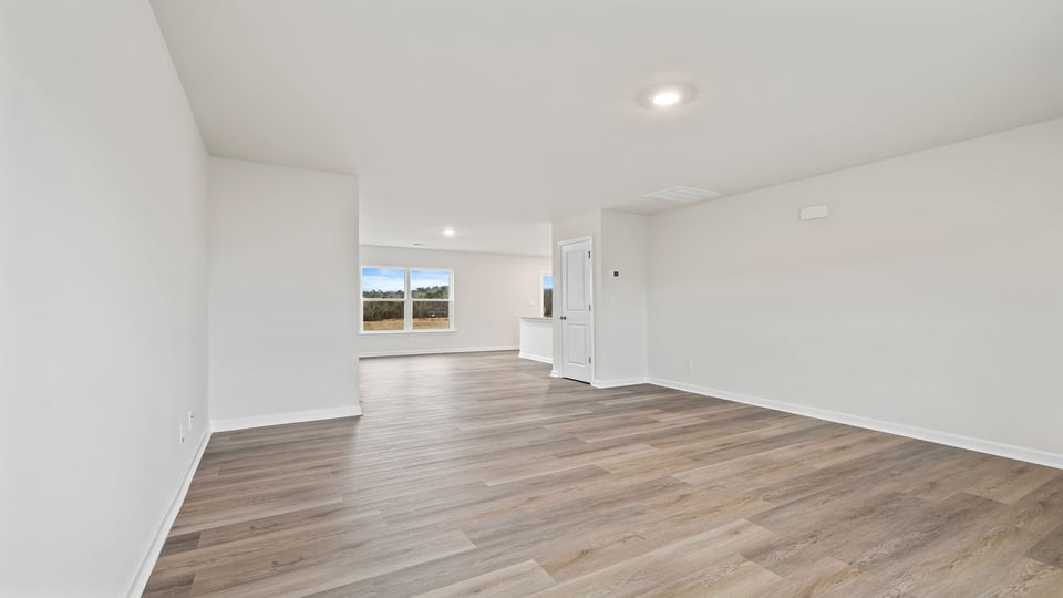 View of the family room into the dining room.