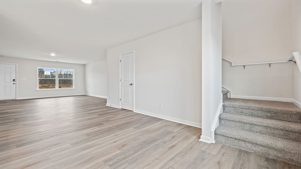 View from the dining room toward the family room and entrance.