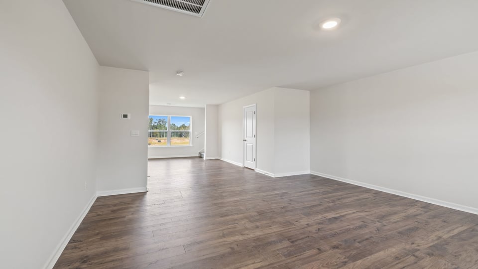 Family room and adjoining dining room.