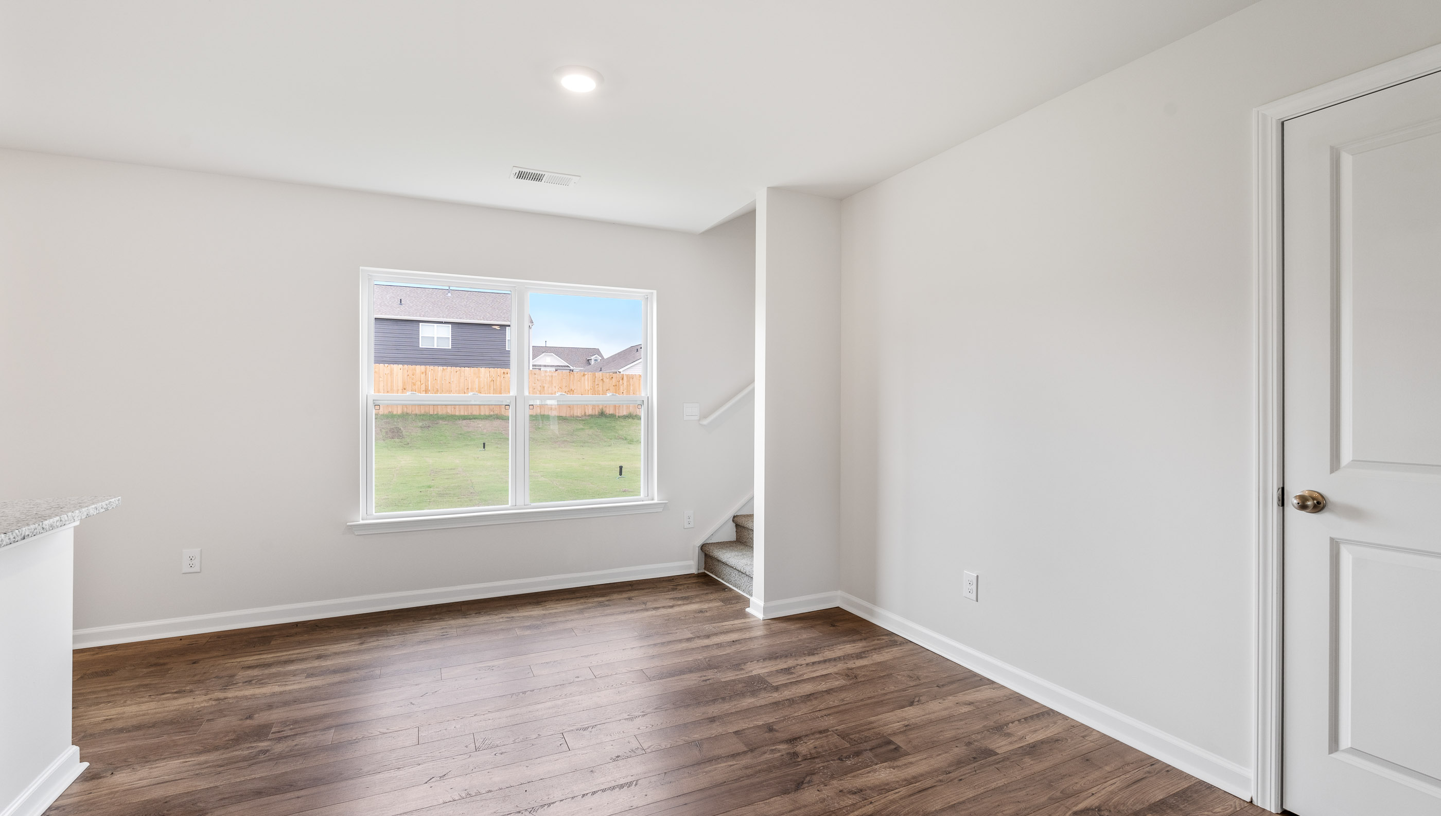 Family room with windows.