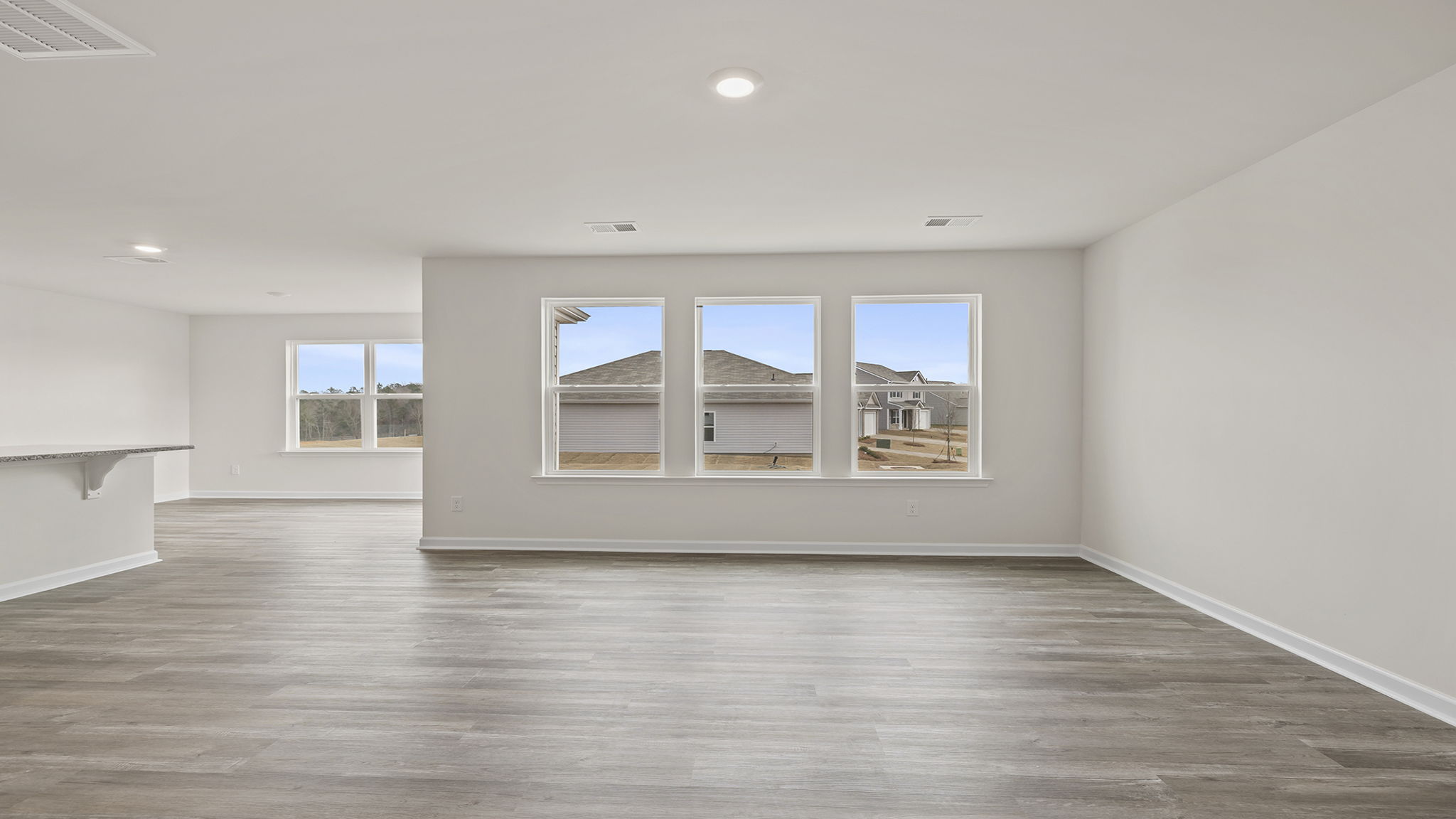 Open floorplan with lots of windows.