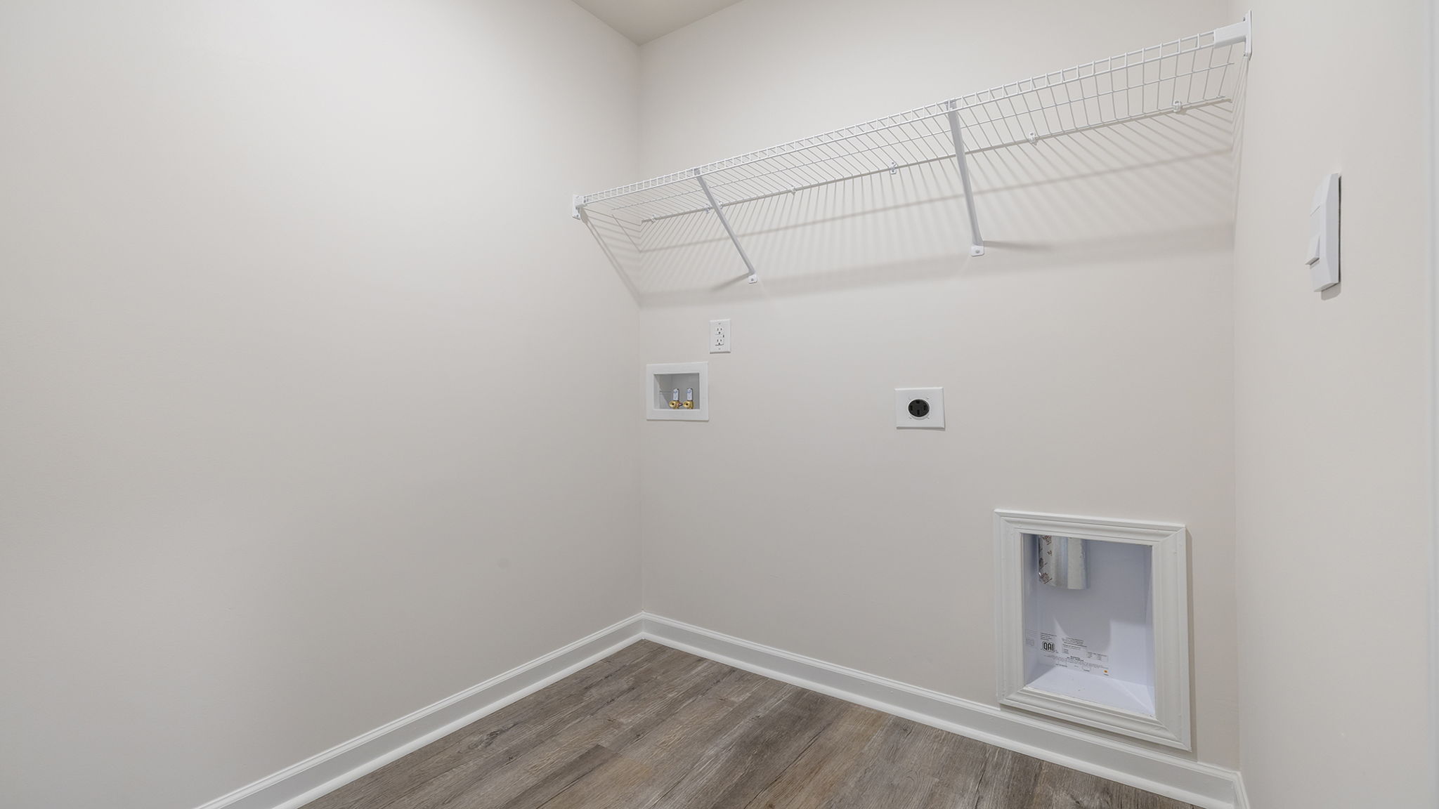 Walk-in laundry room.