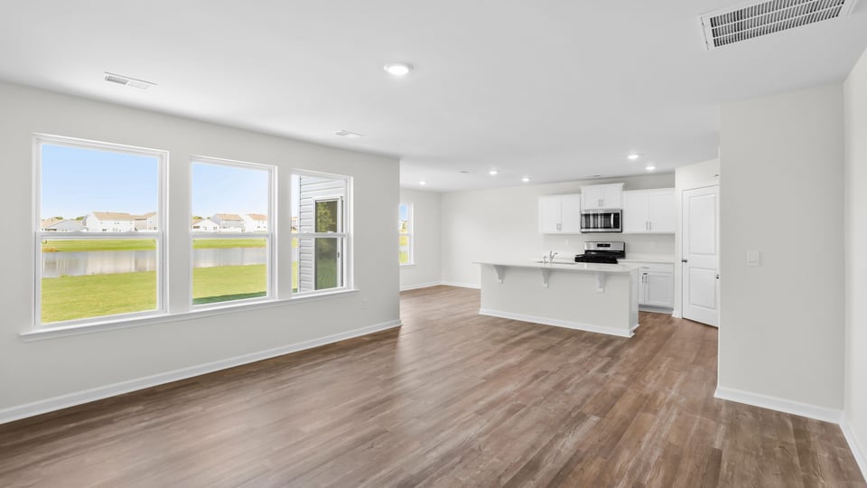 Family room with windows.