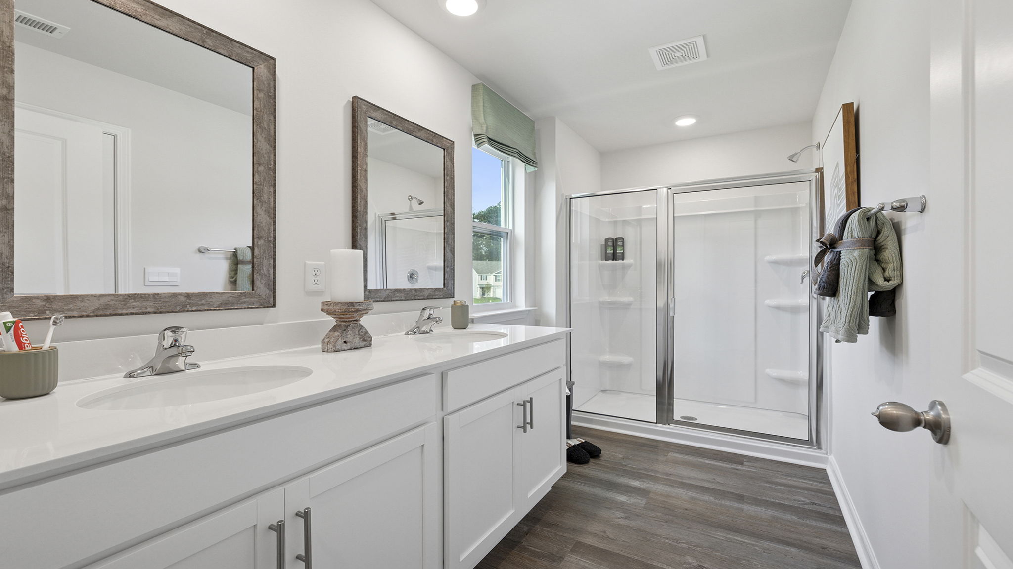 Primary bathroom with double vanity sinks.