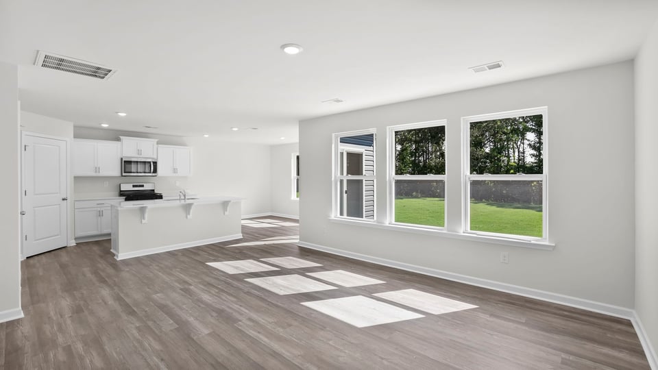 Family room with windows.