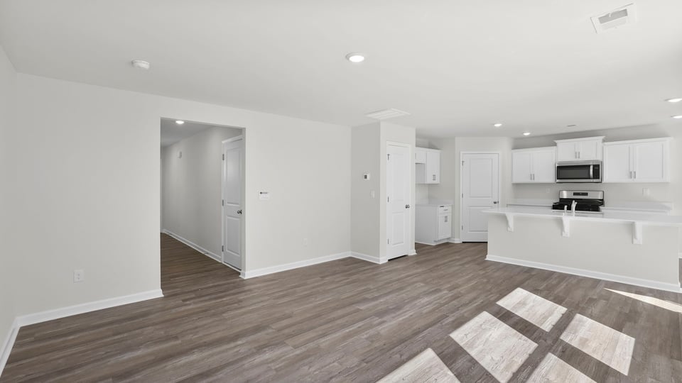 Family room with windows.