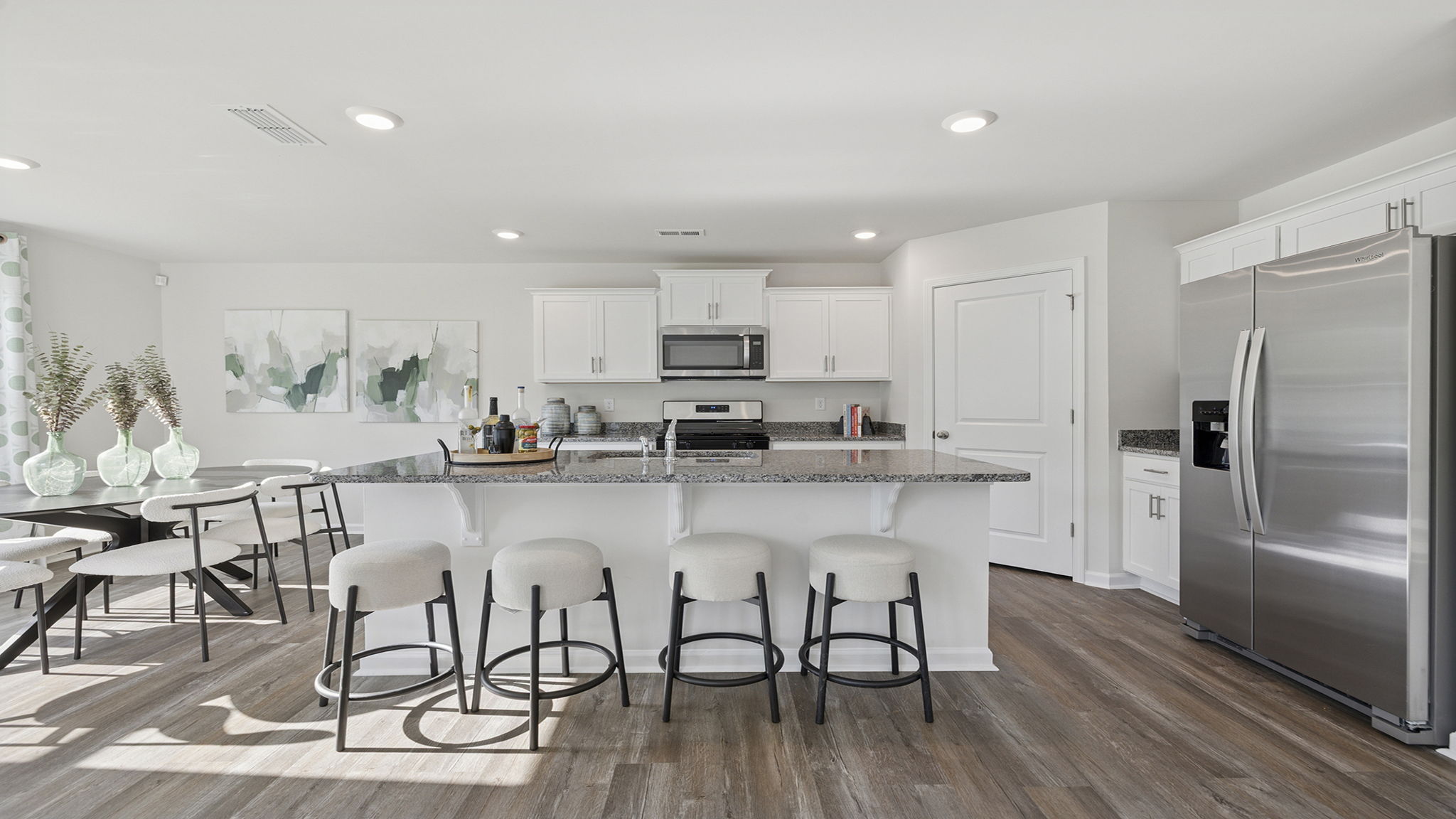 Kitchen with island and cabinets.