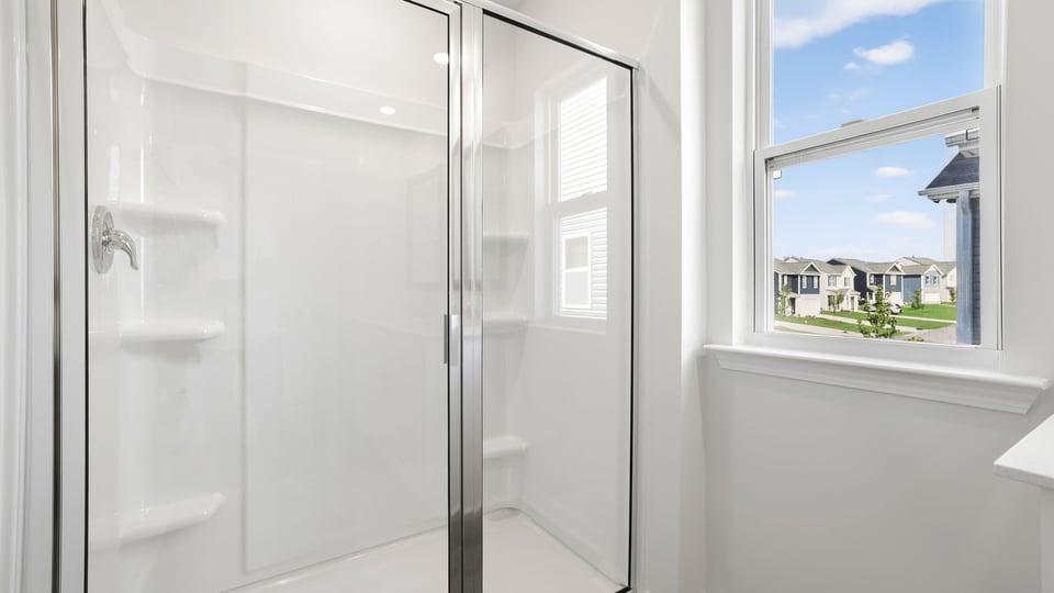 Bathroom with walk in shower.