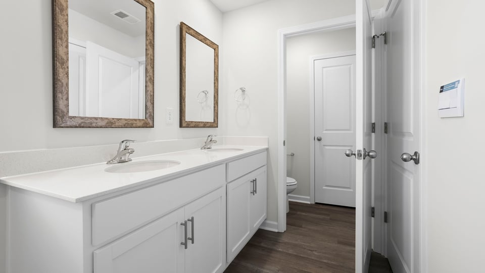 Bathroom with double vanity sink.