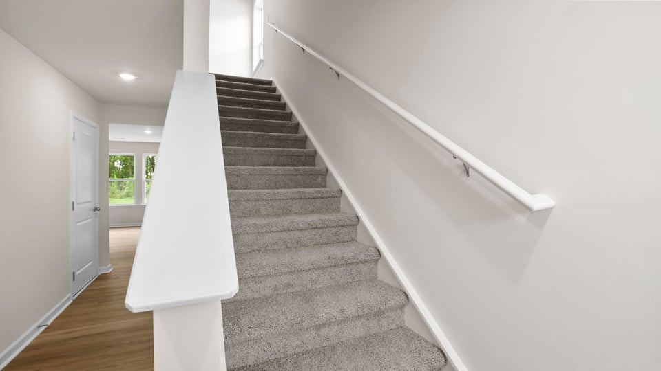 Stairs to bedroom.