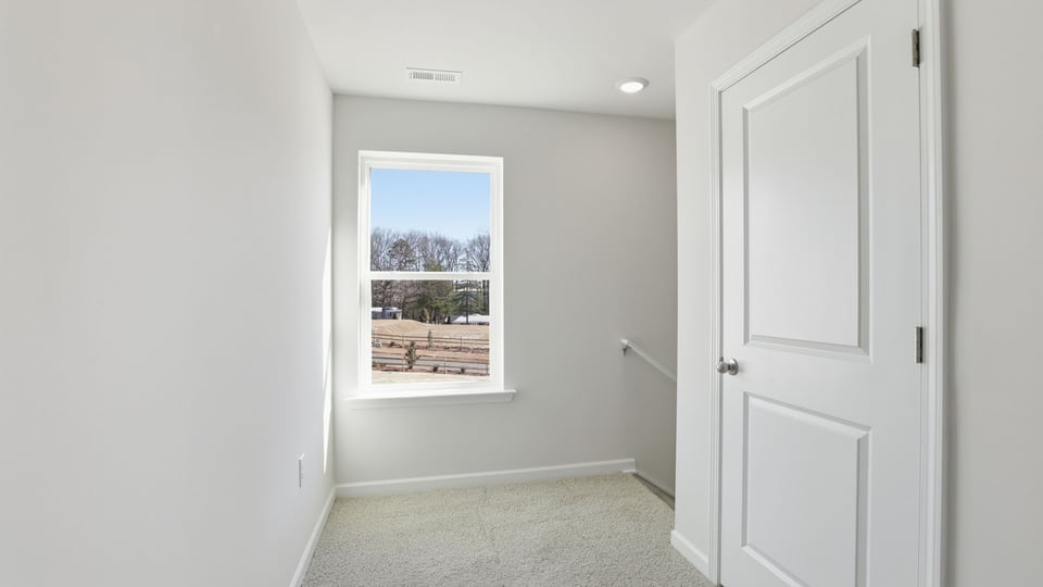 View of landing at top of the stairs.
