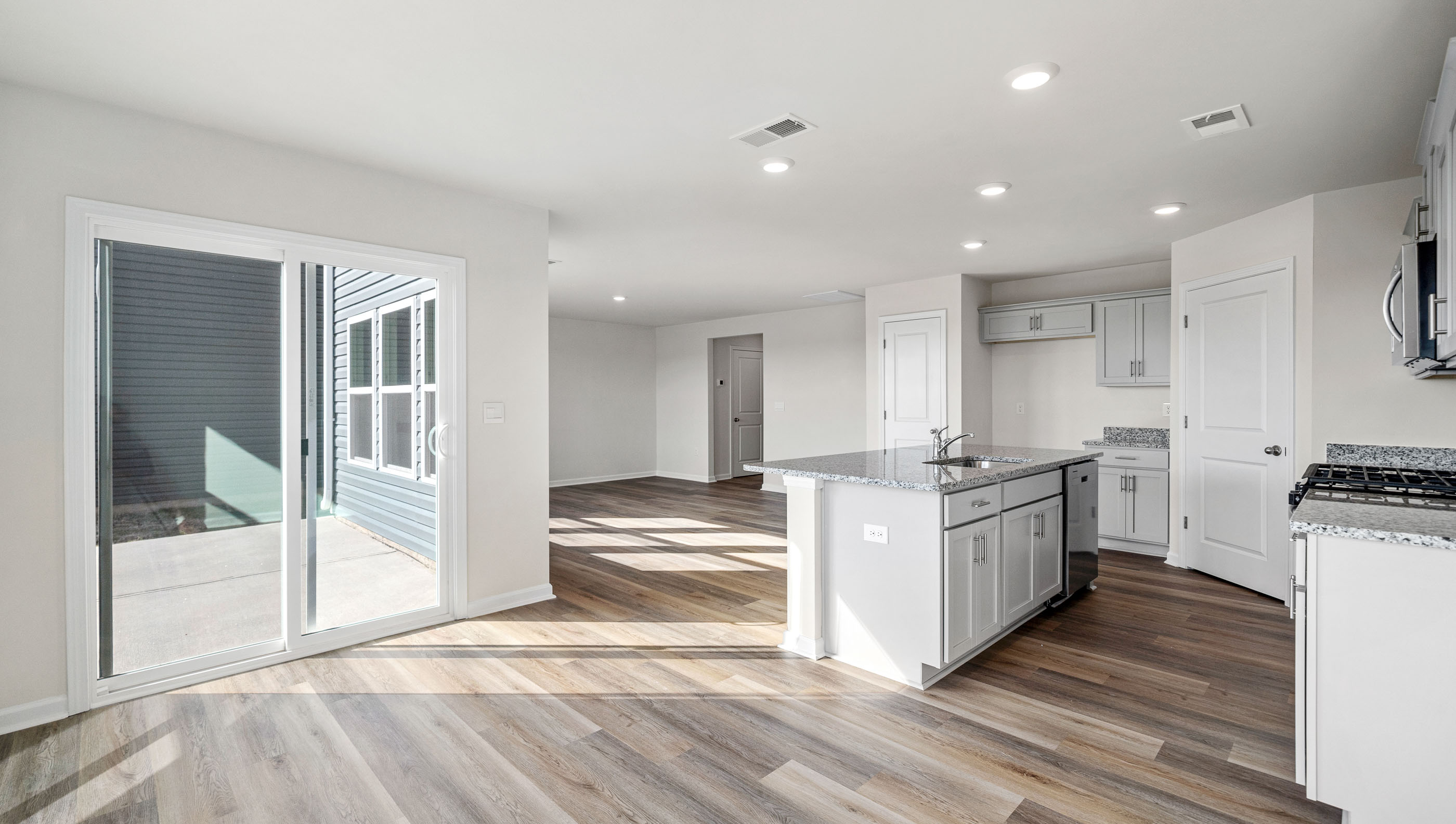Kitchen with island and granite countertops