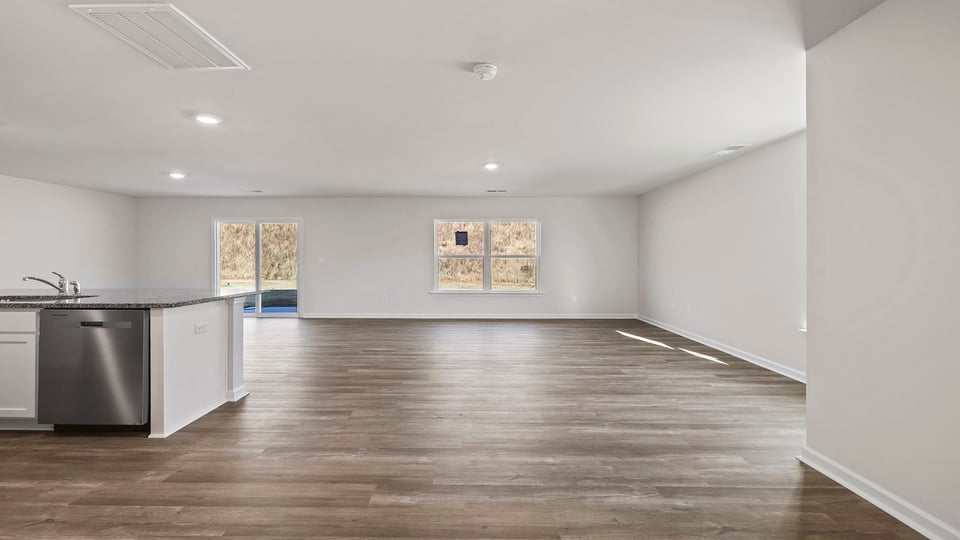 Open floor plan with lots of windows.