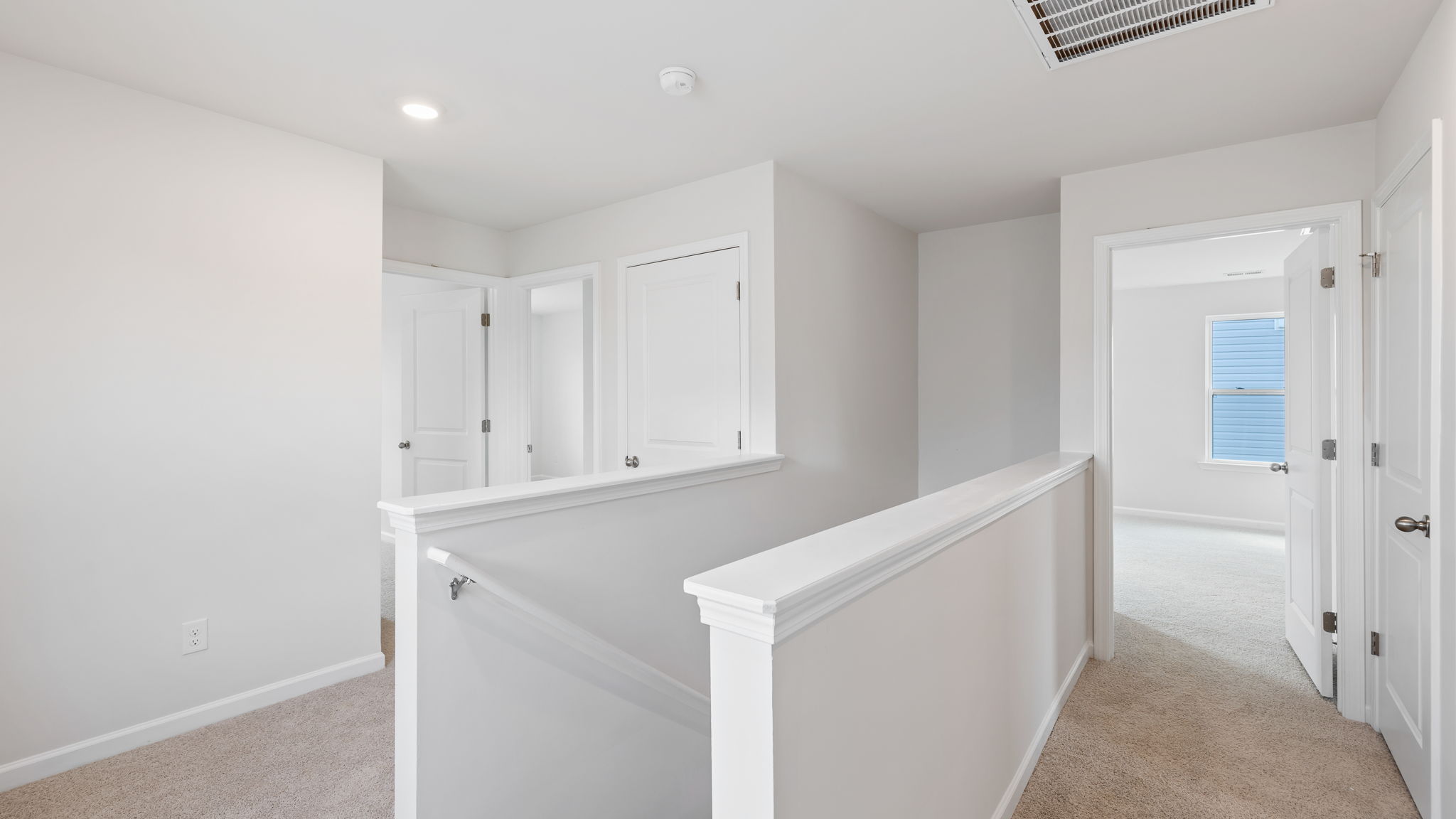 Upper level landing and view of hallway.