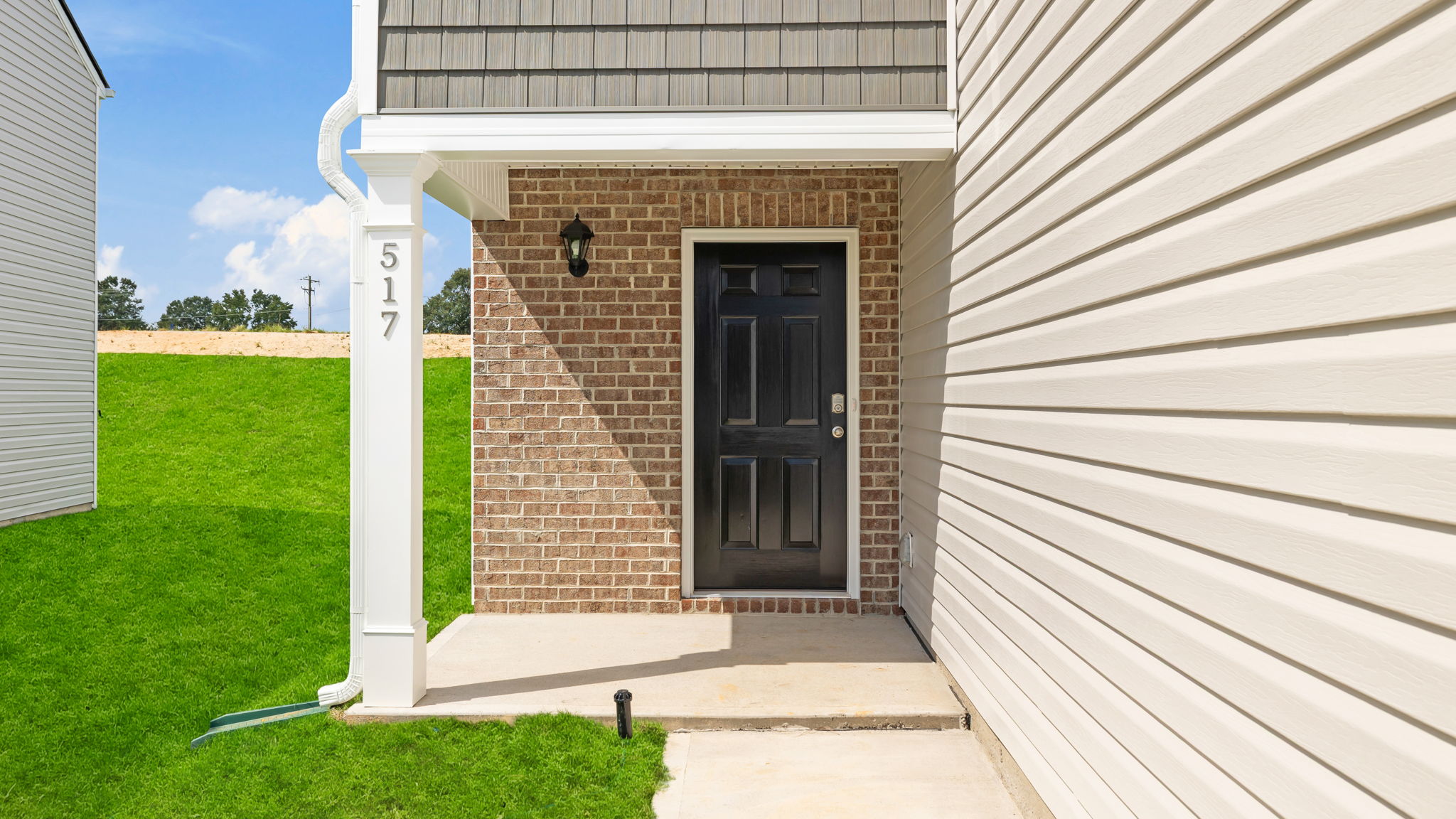 Inviting covered porch and entry.