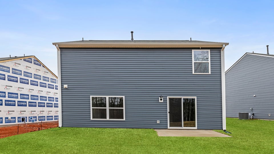 Back exterior with patio.