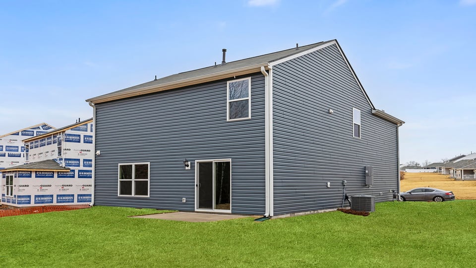 Back exterior with patio.