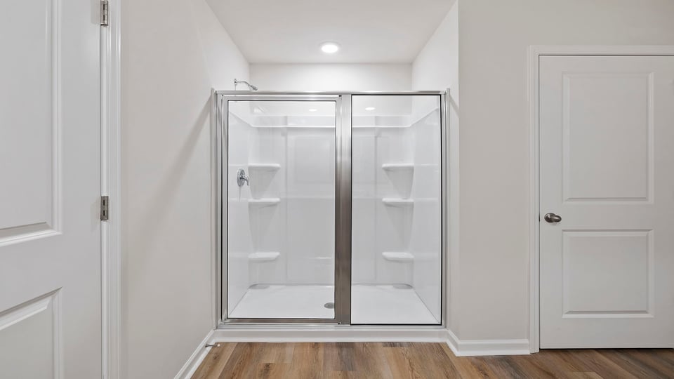 Primary bathroom walk-in shower.