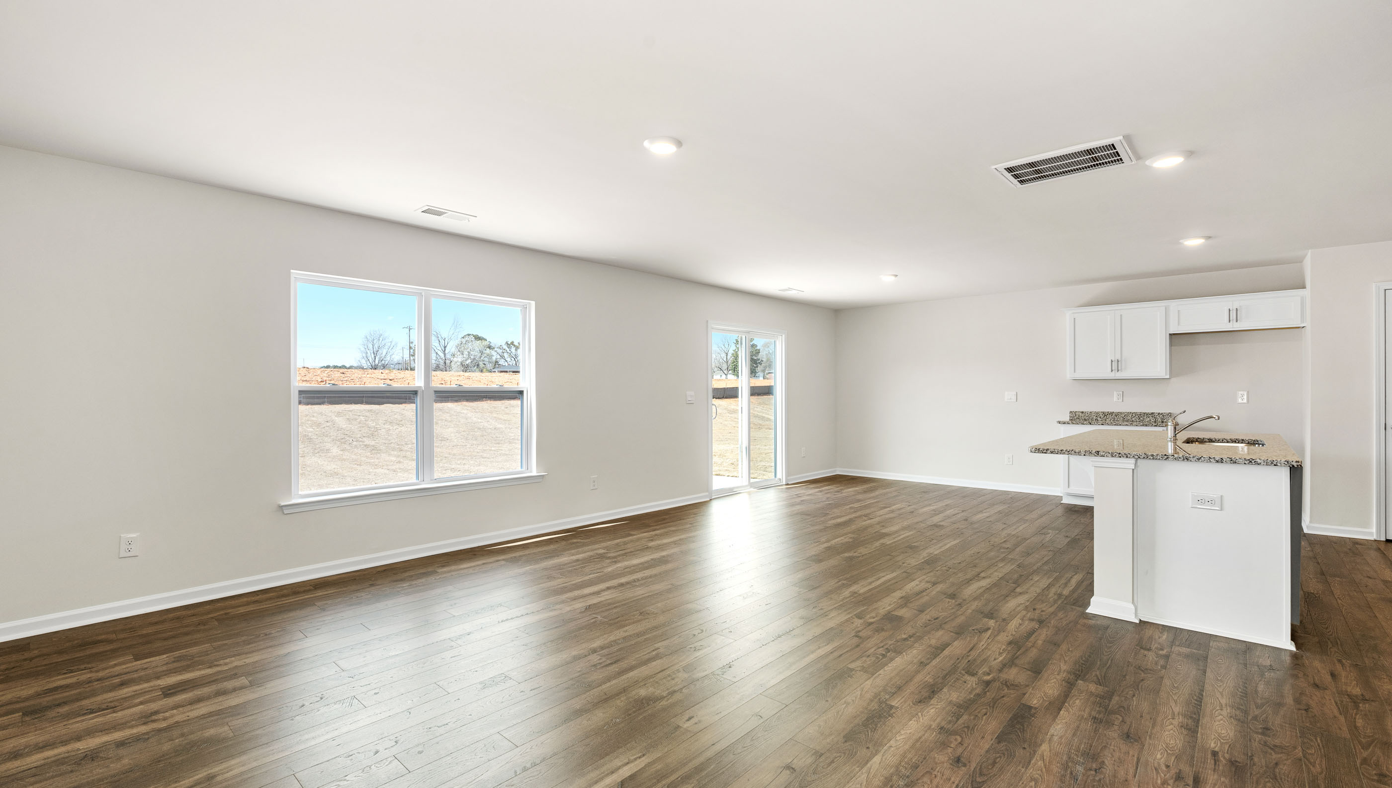 Family room with windows.