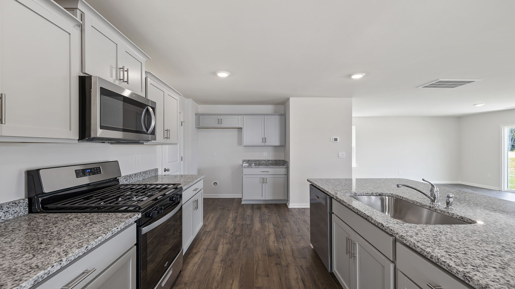 Gas range and built in microwave.