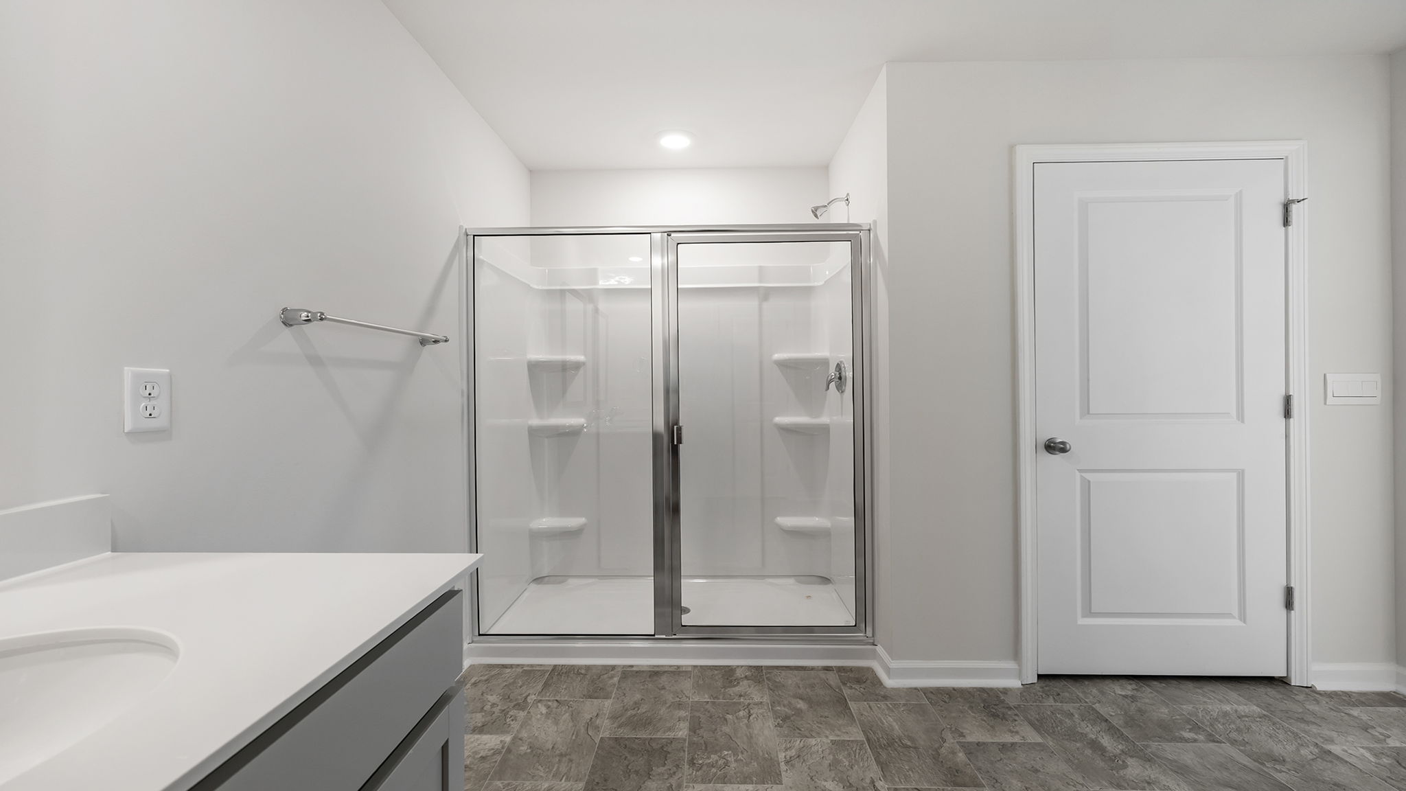 Primary bathroom walk-in shower.