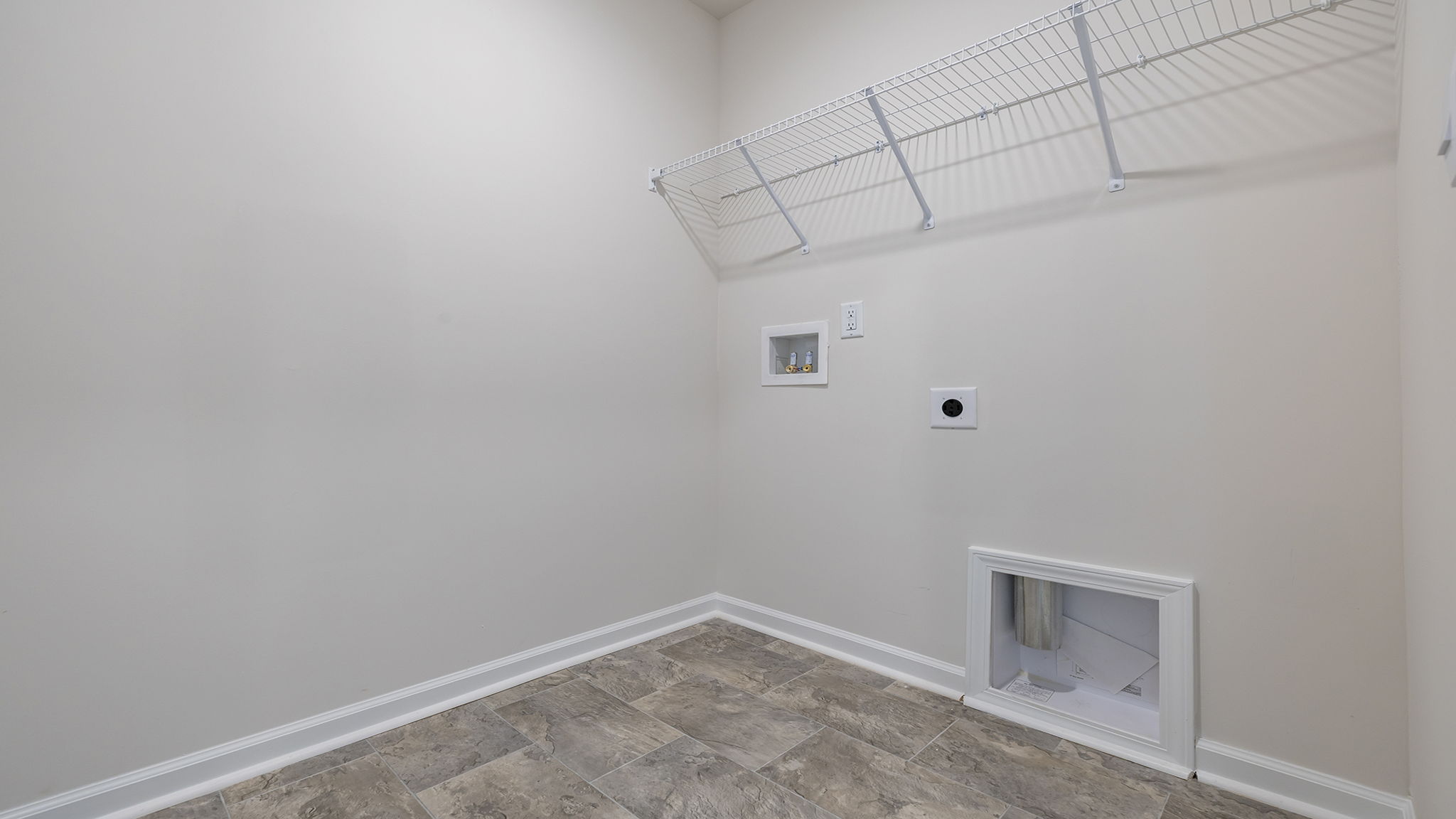 Walk-in laundry room.