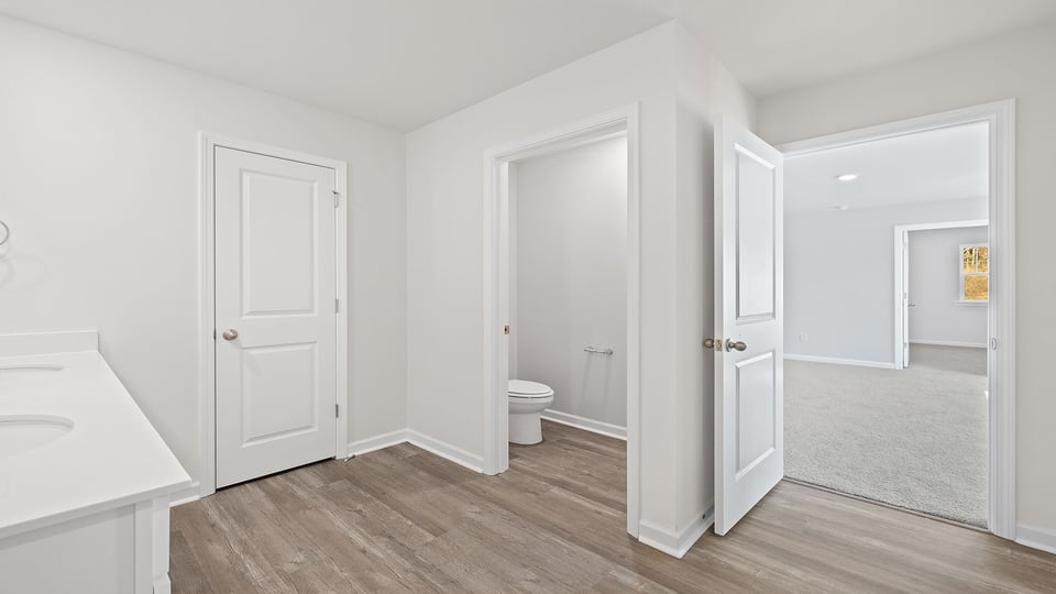 Primary bathroom water closet.