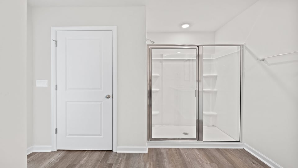 Primary bathroom walk-in shower.
