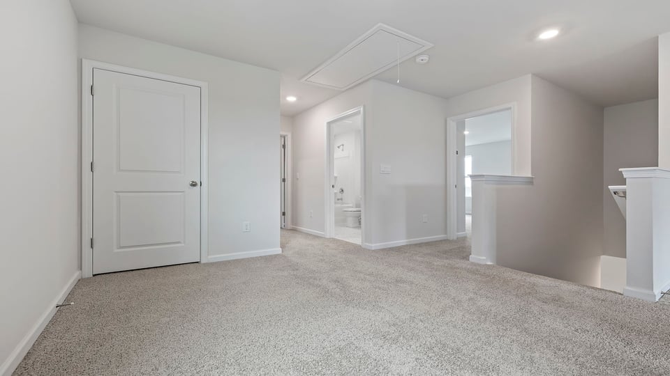 Upper level landing and loft area.