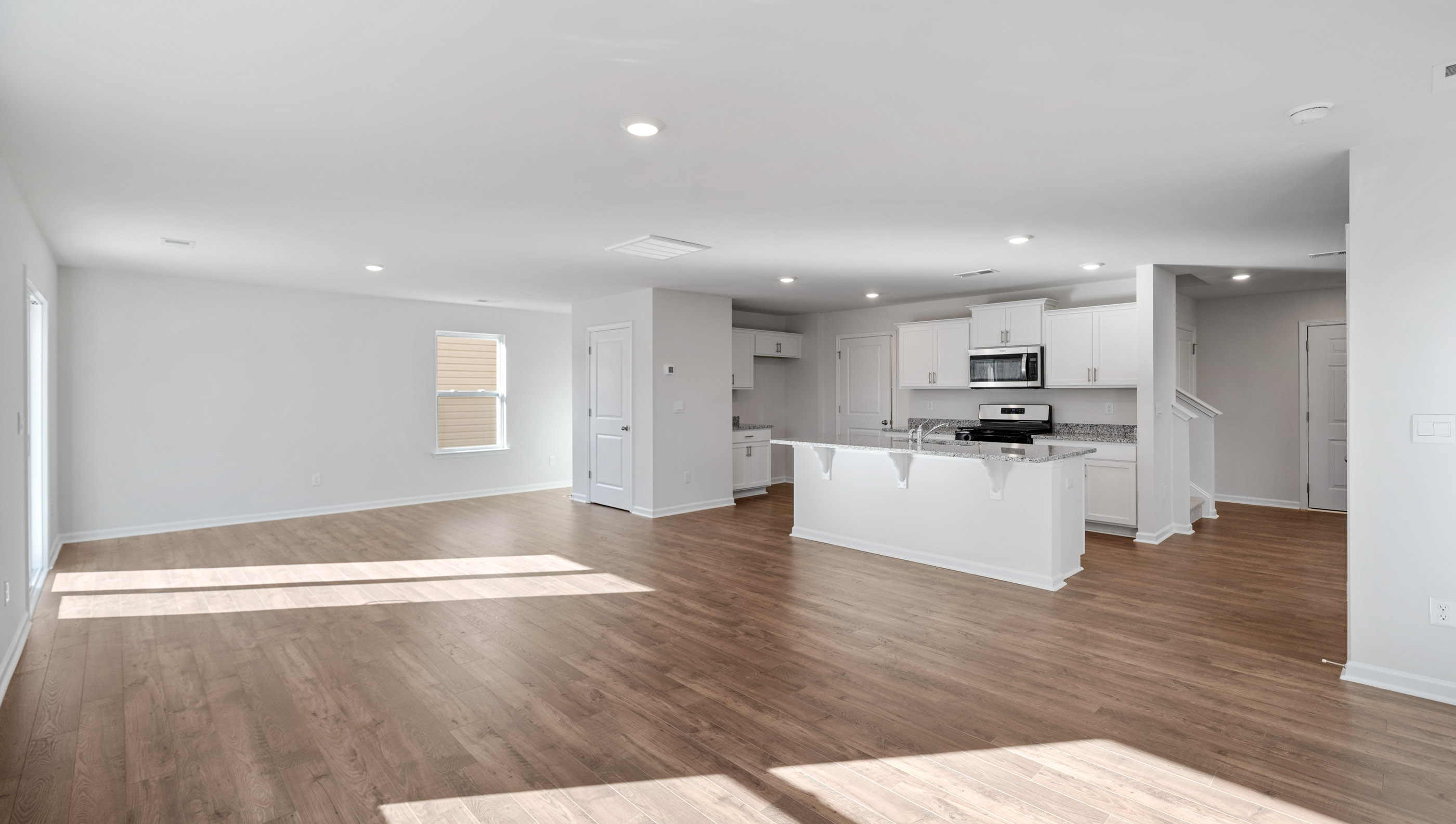 Family room with windows.