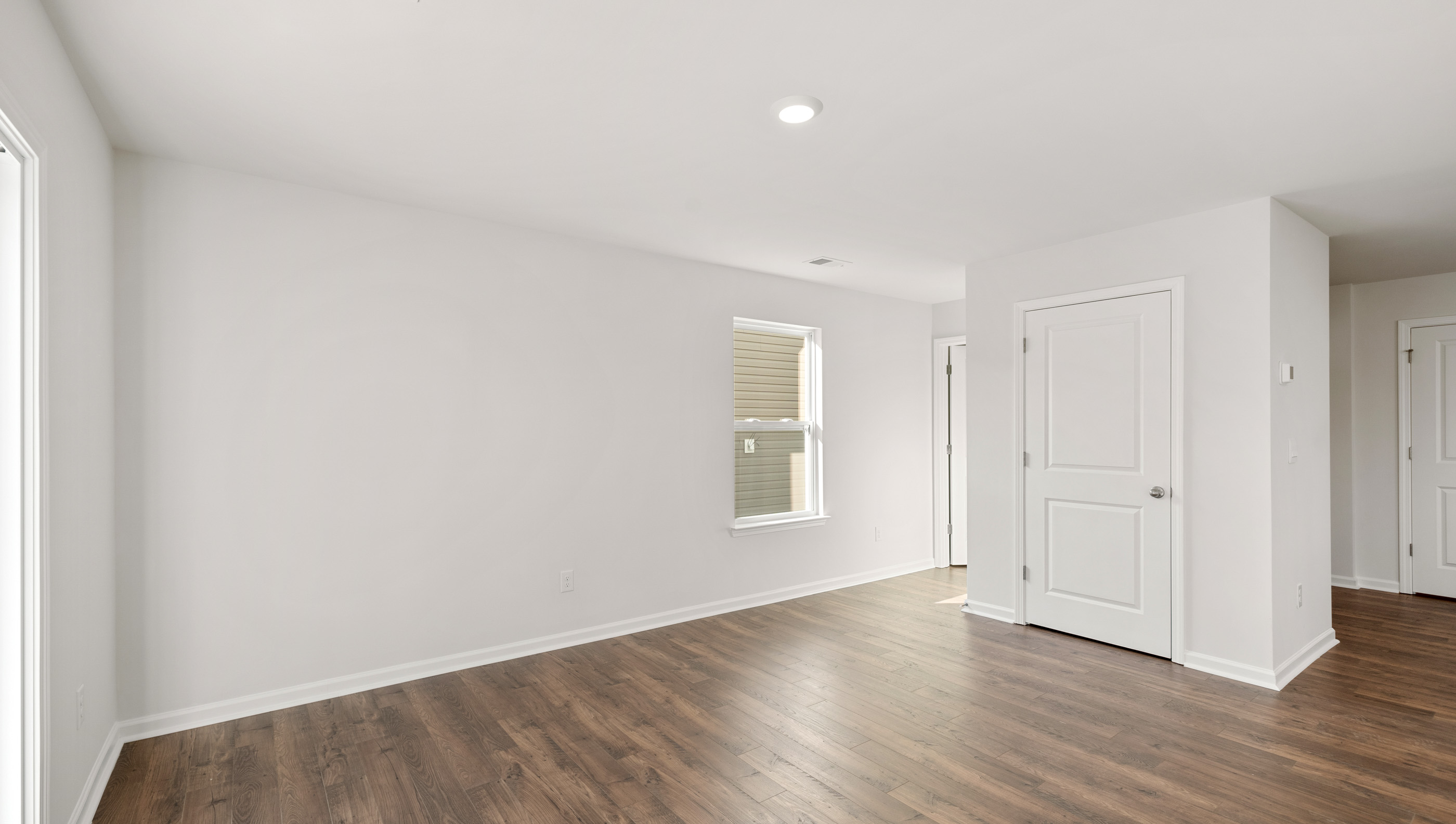 Family room with windows.