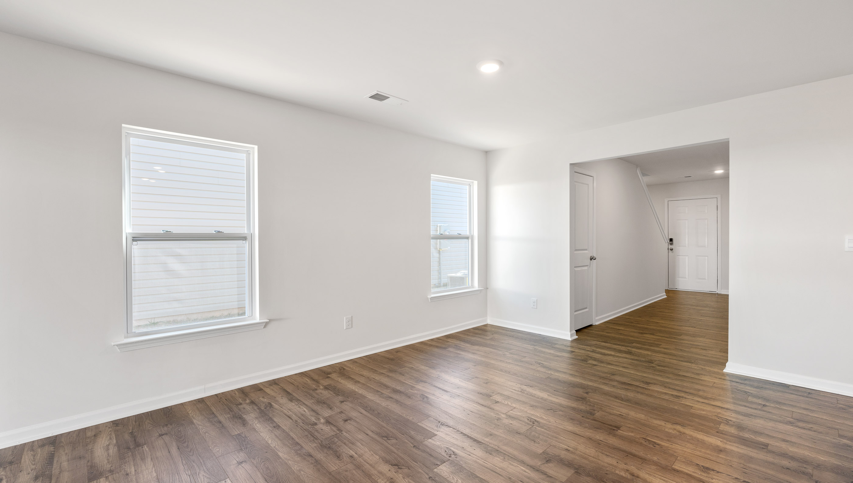 View of hallway leading to dining room.