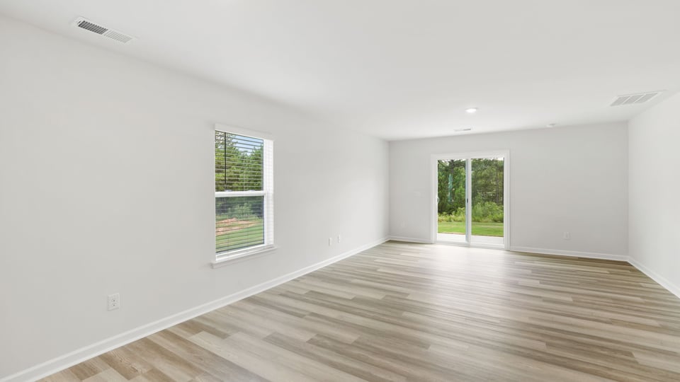 Family room with windows.