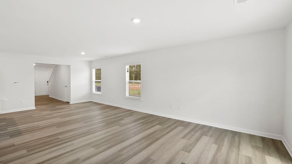Family room with windows.