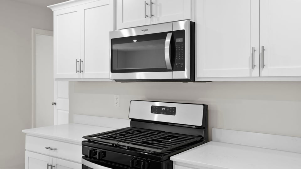 Kitchen with stainless steel appliances.