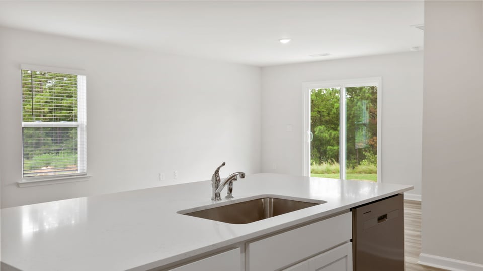 Kitchen with stainless steel appliances.