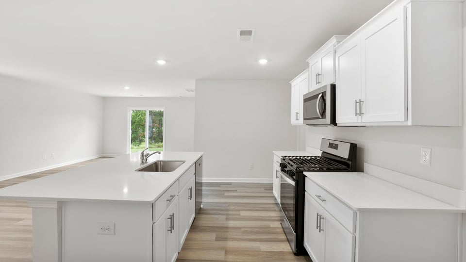 Kitchen with stainless steel appliances.