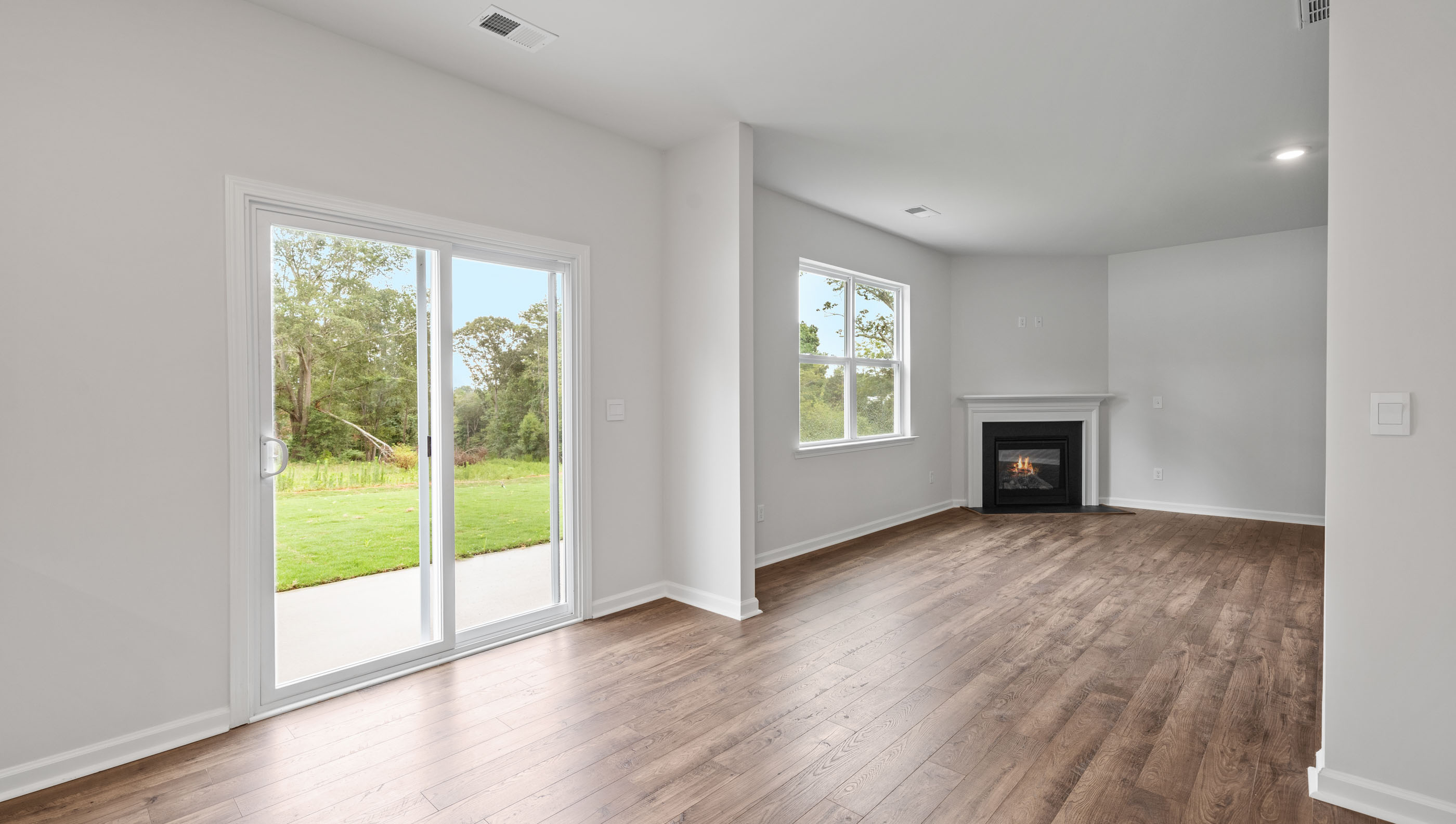Kitchen and island with granite counter tops.