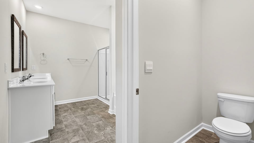 Primary bathroom with double vanity sinks.
