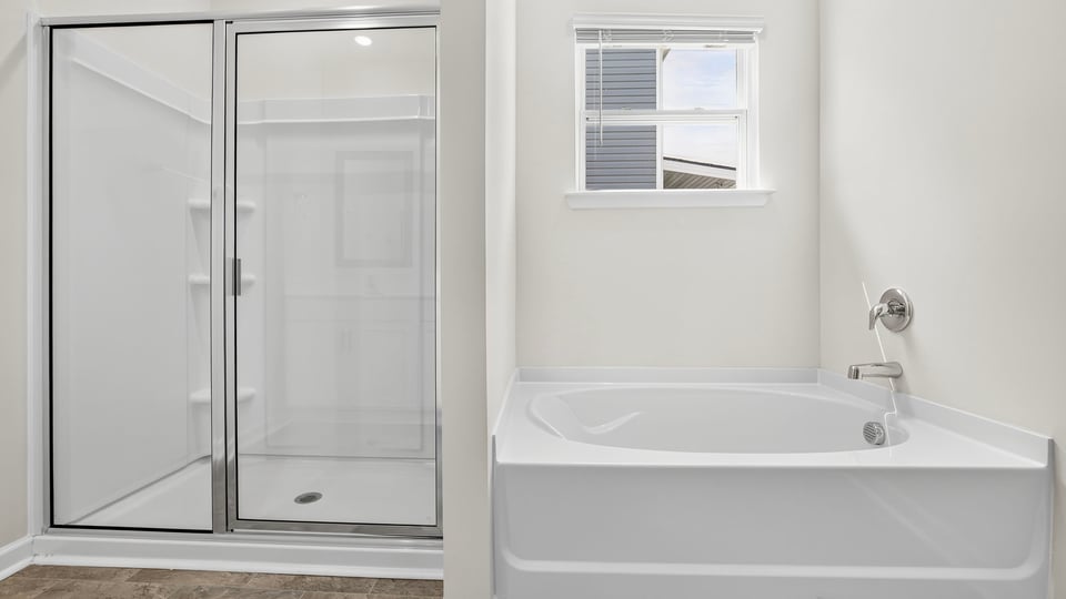 Primary bathroom with double vanity sinks.
