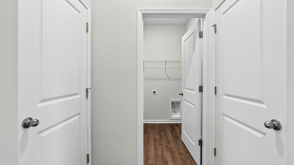 Primary closet with shelf/